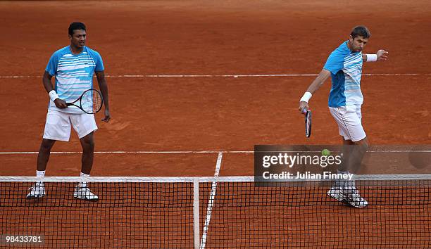 Mahesh Bhupathi of India and Max Mirnyi of Belarus in action against Marcin Matkowski and Mariusz Fyrstenberg of Poland during day two of the ATP...