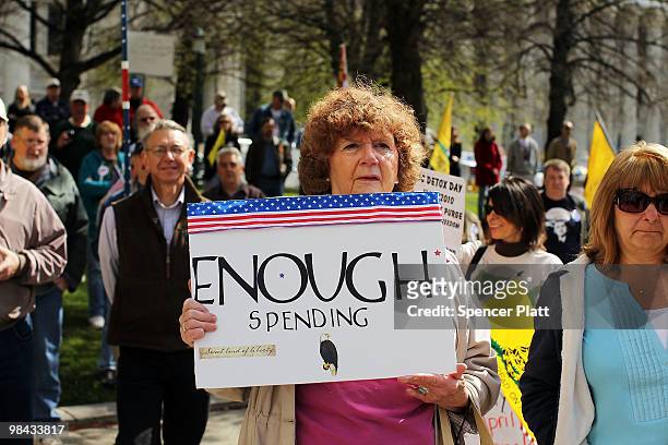Participant at a Tea Party Express rally displays a sign critical of the Obama administration on April 13, 2010 in Albany, New York. The Tea Party...