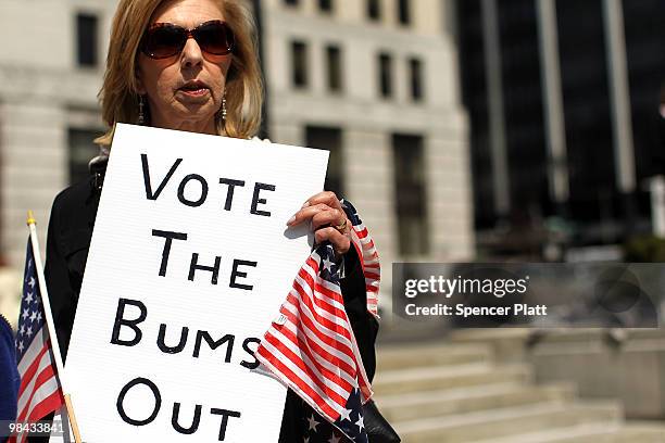 Participant at a Tea Party Express rally displays a sign critical of the Obama administration on April 13, 2010 in Albany, New York. The Tea Party...