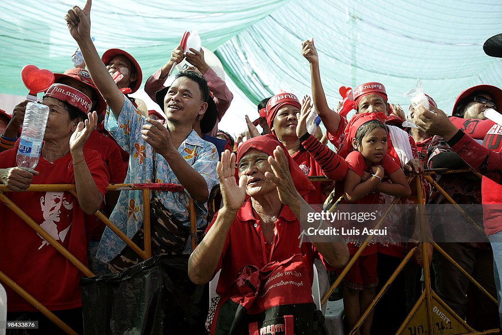 Red Shirts & Tourists Celebrate Thai New Year Amid Political Instability