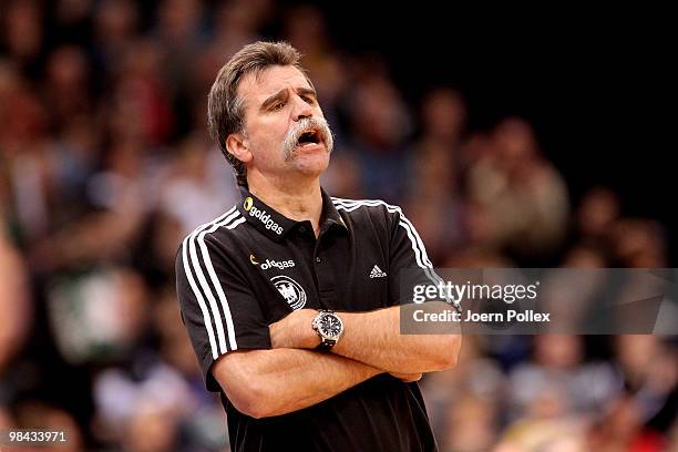 Head coach Heiner Brand of Germany shouts during the charity match for benefit of Oleg Velyky's family at the Color Line Arena on April 13, 2010 in...