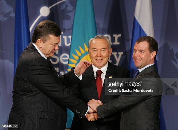 Russian President Dmitry Medvedev , President of Ukraine Viktor Yanukovych and Kazakh President Nursultan Nazarbayev shake hands during the summit of...
