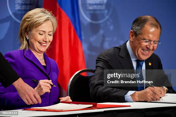 Secretary of State Hillary Clinton and Russian Foreign Minister Sergey Lavrov sign a plutonium disposition protocol at the Nuclear Security Summit on...