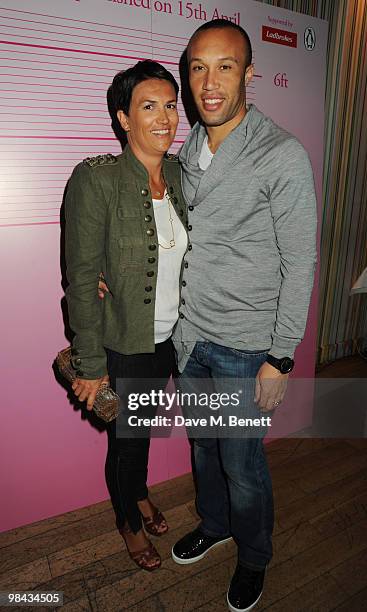 Mikael Silvestre with wife attend the book launch of Martel Maxwell's book 'Scandalous', at The Groucho Club on April 13, 2010 in London, England.