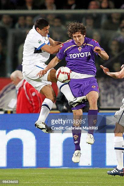 Stevan Jovetic of ACF Fiorentina battles for the ball with Ivan Cordoba of FC Internazionale Milano during the Tim Cup ACF Fiorentina and FC...