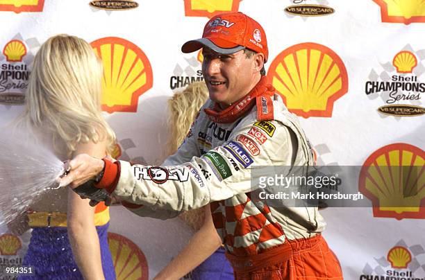 Mark Skaife of Holden sprays the crowd after winning race 2 during the Round 3 V8 Shell Championship Series held at Eastern Creek Raceway, Sydney,...