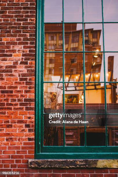 dusk in the distillery district - haan stock pictures, royalty-free photos & images