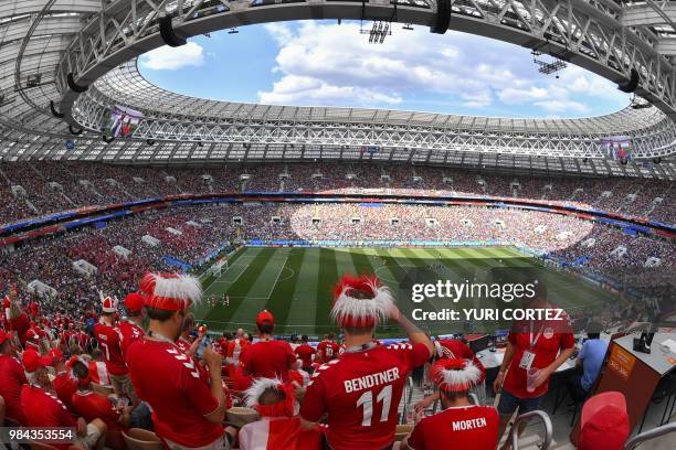 Denmark supporters prepare for the Russia 2018 World Cup Group C football match between Denmark and France at the Luzhniki Stadium in Moscow on June...