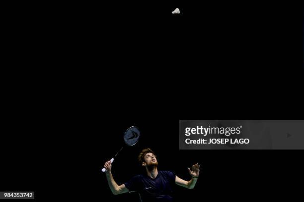 French Lucas Maurice Corvee returns to Spanish Pablo Abian during their badminton Men's Singles Finals - Gold Medal Match at the XVIII Mediterranean...