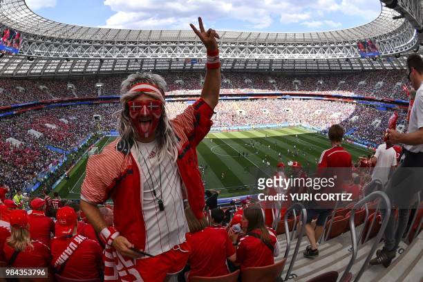 Denmark supporters prepare for the Russia 2018 World Cup Group C football match between Denmark and France at the Luzhniki Stadium in Moscow on June...