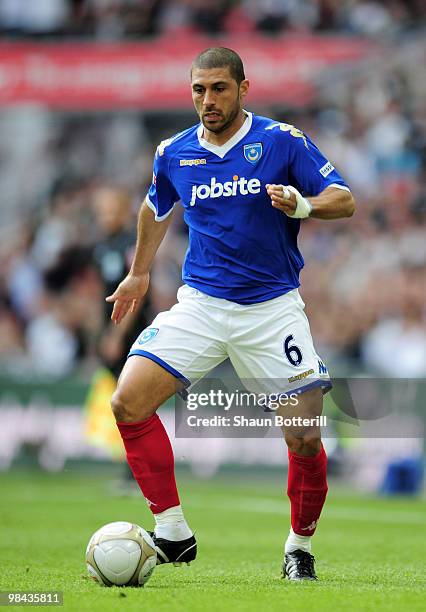 Hayden Mullins of Portsmouth in action during the FA Cup sponsored by E.ON Semi Final match between Tottenham Hotspur and Portsmouth at Wembley...