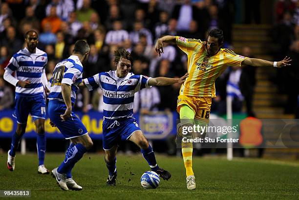 Newcastle United player Jonas Guitierrez takes on the Reading defence during the Coca-Cola Championship game between Reading and Newcastle United at...