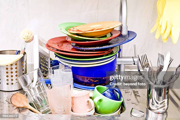 washing-up in kitchen sink - scrubbing brush stock pictures, royalty-free photos & images