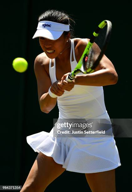 Lizette Cabrera of Australia plays a backhand against Jana Cepelova of Slovakia during Wimbledon Championships Qualifying - Day 2 at The Bank of...