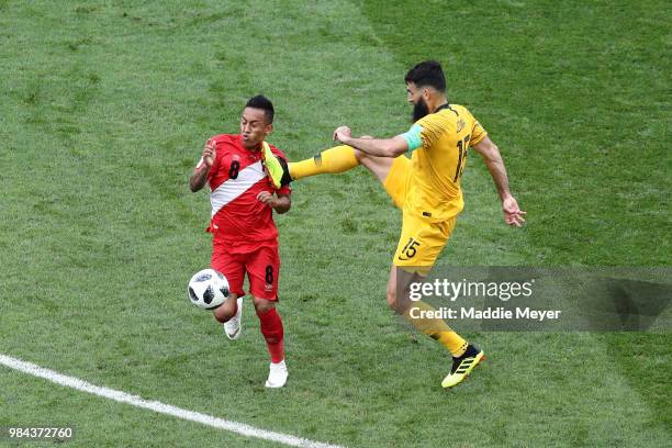 Mile Jedinak of Australia fouls Christian Cueva of Peru during the 2018 FIFA World Cup Russia group C match between Australia and Peru at Fisht...
