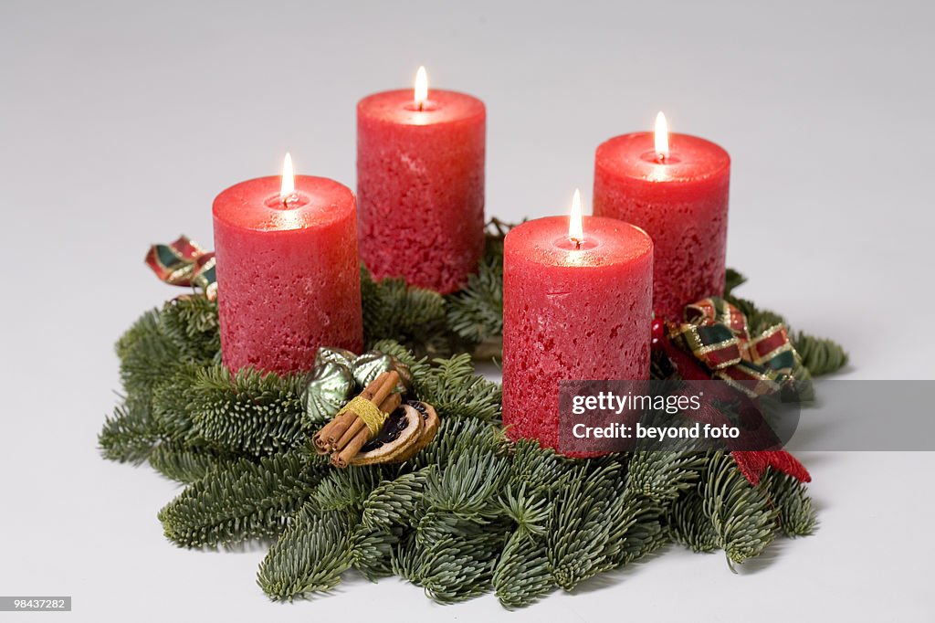 Advent wreath with four burning candles