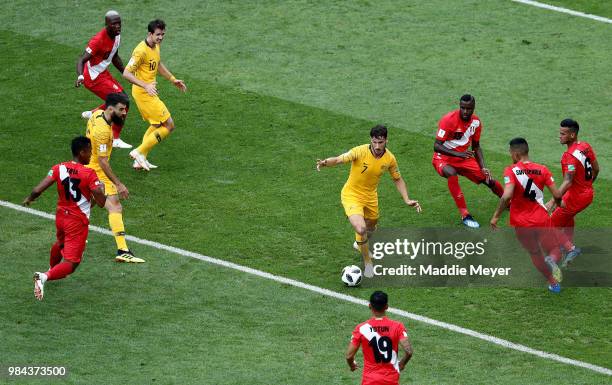 Mathew Leckie of Australia is challenged by Peru players during the 2018 FIFA World Cup Russia group C match between Australia and Peru at Fisht...