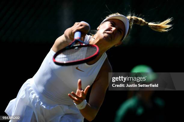 Eugenie Bouchard of Canada serves against Lin Zhu of China during Wimbledon Championships Qualifying - Day 2 at The Bank of England Sports Centre on...