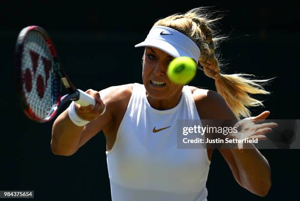 Sabine Lisicki of Germany plays a forehand against Anna Kalinskaya of Russia during Wimbledon Championships Qualifying - Day 2 at The Bank of England...