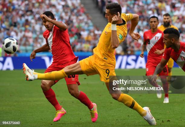 Peru's midfielder Edison Flores vies vies for the ball with Australia's forward Tomi Juric during the Russia 2018 World Cup Group C football match...