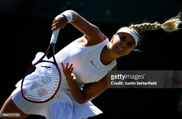 Sabine Lisicki of Germany serves against Anna Kalinskaya of Russia during Wimbledon Championships Qualifying - Day 2 at The Bank of England Sports...