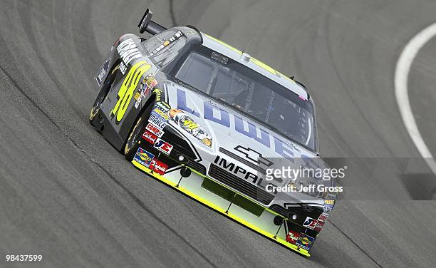 Jimmie Johnson, driver of the Lowe's Chevrolet during practice for the NASCAR Sprint Cup Series Auto Club 500 at Auto Club Speedway on February 19,...