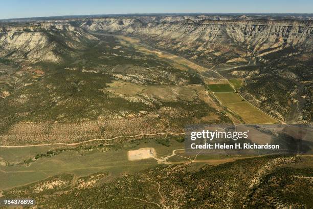 Existing gas and oil development in the Plateau Creek Drainage, near where BLM leases were sold in December 2016 and December 2017, can be seen from...