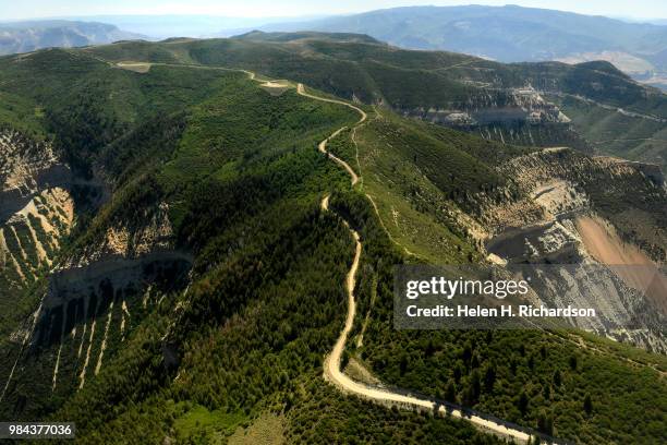 Existing gas and oil development near the Roan Plateau can be seen from an EcoFlight plane on June 25, 2018 near De Beque, Colorado. In April, five...