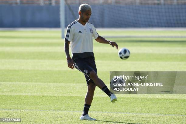 Mexico's forward Jesus Corona kicks the ball during a training session at Ekaterinburg Arena in Ekaterinburg on June 26 on the eve of their Russia...