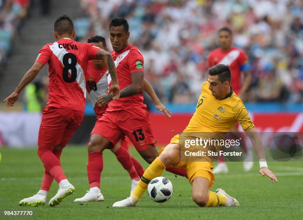 Tomi Juric of Australia and Renato Tapia of Peru compete for the ball during the 2018 FIFA World Cup Russia group C match between Australia and Peru...