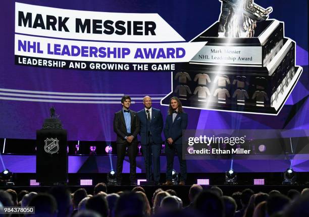 Actor Andrew Herr, Hockey Hall of Fame member Mark Messier and actor Dylan Playfair present the Mark Messier NHL Leadership Award during the 2018 NHL...