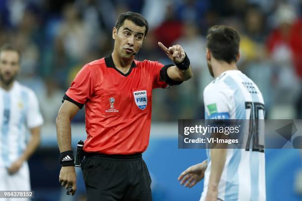 Referee Ravshan Irmatov, Lionel Messi of Argentina during the 2018 FIFA World Cup Russia group D match between Argentina and Croatia at the Novgorod...