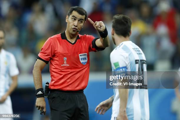 Referee Ravshan Irmatov, Lionel Messi of Argentina during the 2018 FIFA World Cup Russia group D match between Argentina and Croatia at the Novgorod...