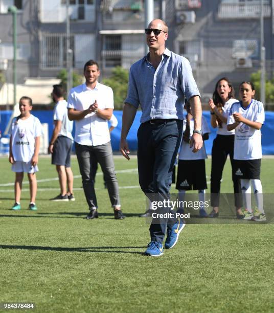 Prince William, Duke of Cambridge attends a session at the Equaliser football programme during his official tour of Jordan, Israel and the Occupied...