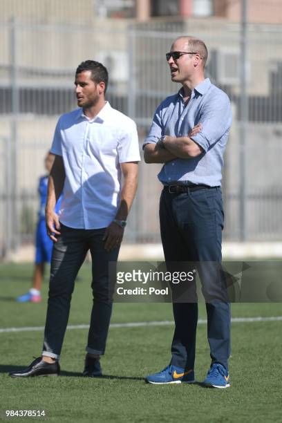 Prince William, Duke of Cambridge and footballer Tomer Hemed attend a session at the Equaliser football programme during his official tour of Jordan,...