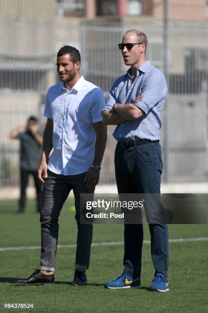 Prince William, Duke of Cambridge and footballer Tomer Hemed attend a session at the Equaliser football programme during his official tour of Jordan,...