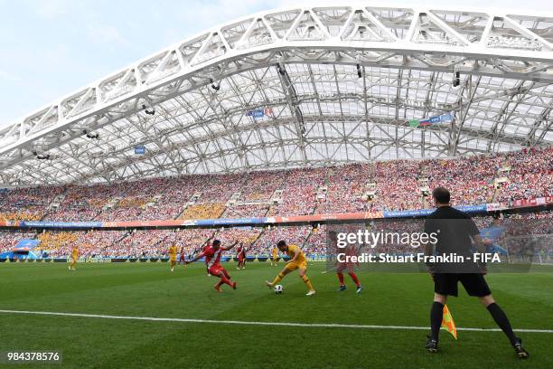 General view of Fisht stadium as Mathew Leckie of Australia runs with the ball at Edison Flores and Miguel Trauco of Peru during the 2018 FIFA World...