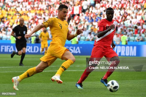 Australia's forward Tomi Juric vies for the ball with Peru's defender Christian Ramos during the Russia 2018 World Cup Group C football match between...