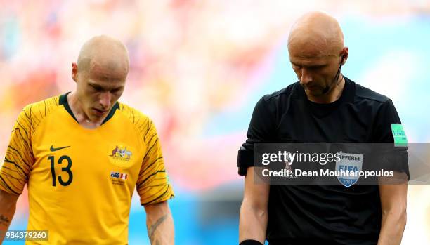 Aaron Mooy of Australia and referee Sergei Karasev looks on during the 2018 FIFA World Cup Russia group C match between Australia and Peru at Fisht...