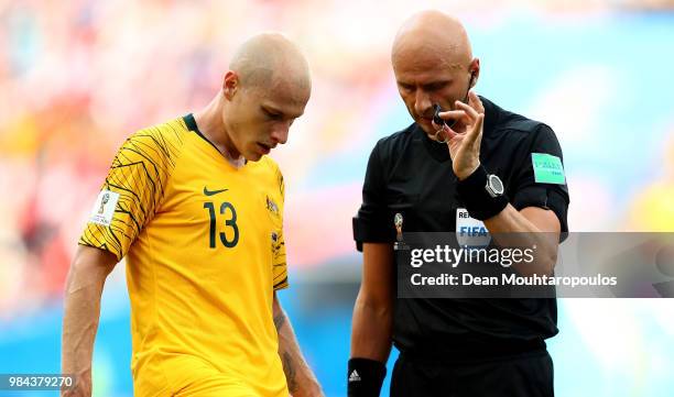 Aaron Mooy of Australia and referee Sergei Karasev looks on during the 2018 FIFA World Cup Russia group C match between Australia and Peru at Fisht...