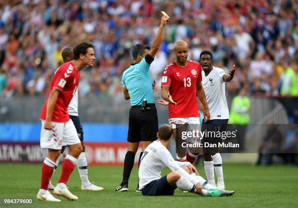 Mathias Jorgensen of Denmark is shown a yellow card by referee ref1a during the 2018 FIFA World Cup Russia group C match between Denmark and France...