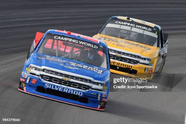 Stewart Friesen We Build America Chevrolet Silverado and Dalton Sargeant Performance Plus Motor Oil Chevrolet Silverado work their way through turn...