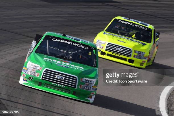 Ben Rhodes ThorSport Racing Ford F-150 and Matt Crafton Ideal Door, Menards ThorSport Racing Ford F-150 work their way through turn four during the...