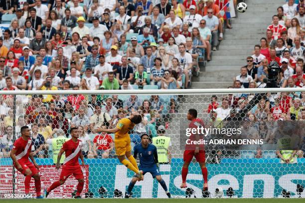 Australia's forward Mathew Leckie jumps for the ball during the Russia 2018 World Cup Group C football match between Australia and Peru at the Fisht...