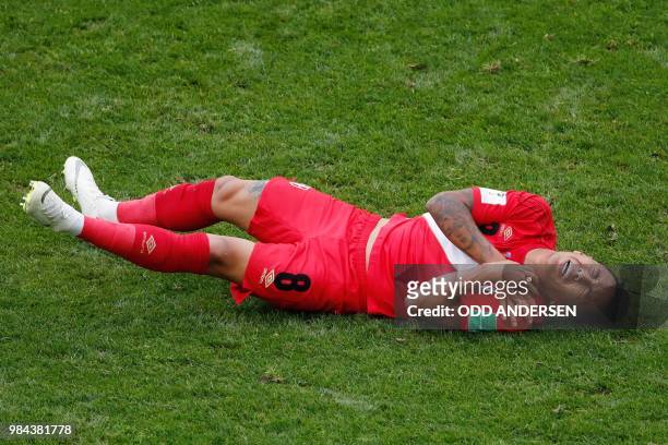 Peru's midfielder Christian Cueva reacts after being fouled during the Russia 2018 World Cup Group C football match between Australia and Peru at the...