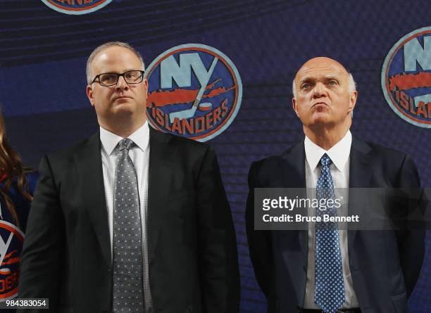 Chris and Lou Lamoriello of the New York Islanders during the first round of the 2018 NHL Draft at American Airlines Center on June 22, 2018 in...