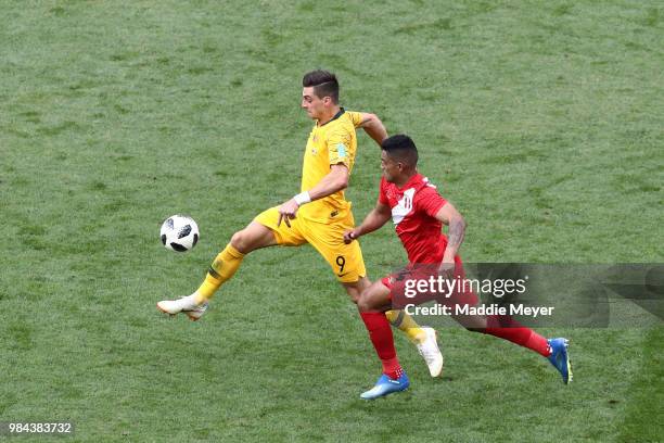 Tomi Juric of Australia is challenged by Anderson Santamaria of Peru during the 2018 FIFA World Cup Russia group C match between Australia and Peru...