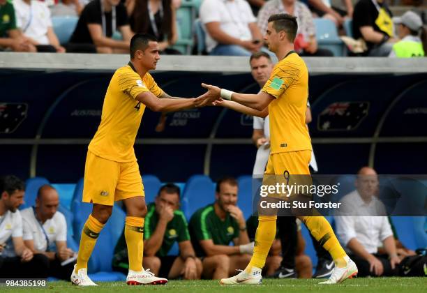 Tomi Juric of Australia greets Tim Cahill of Australia as Tomi Juric is substituted off and Tim Cahill is substituted on during the 2018 FIFA World...
