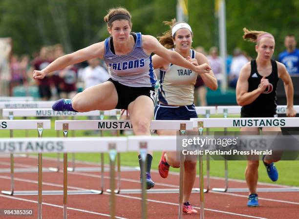 Lauren Sterling of Mountain Valley pulls ahead to win the 100 meter hurdles at the Class C state championship track meet.