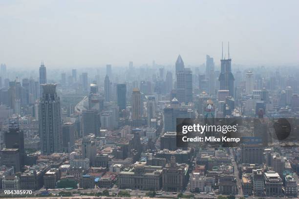 View looking from The Oriental Pearl Tower in Pudong, across the Huang Pu River to Puxi Shanghais downtown area in Shanghai, China. The Bunds western...